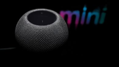 A smart speaker on a table in a living room